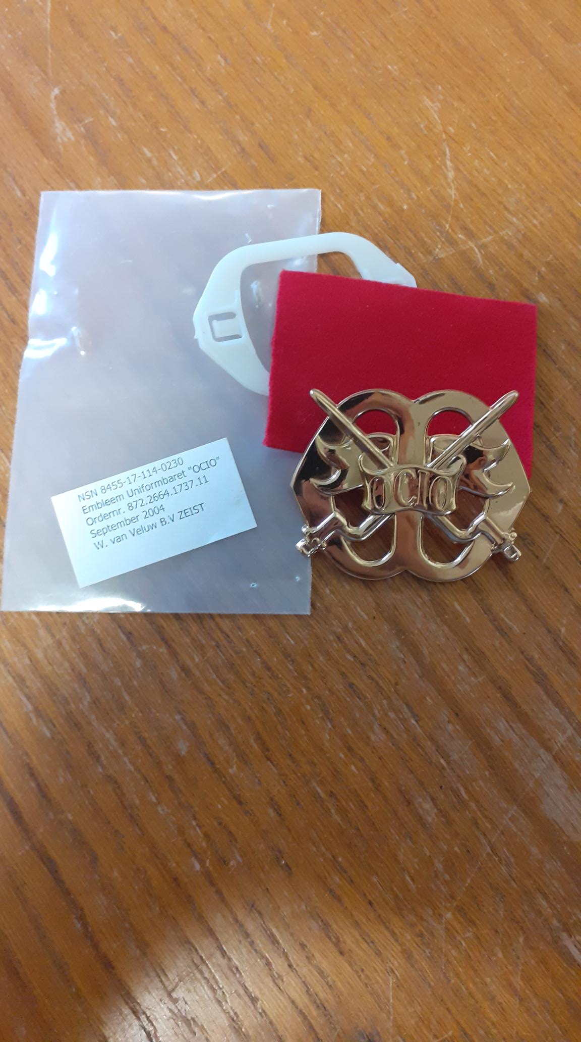 baret embleem "ocio "